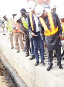 L-R:  Group Managing Director, Flour Mills of Nigeria Plc, Paul Gbededo; President/CE, Dangote Industries Limited, Aliko Dangote; and Managing Director, AG-Dangote Construction Company Limited, on the road inspection of Apapa-Wharf Road under construction by AG-Dangote Construction Company on Wednesday