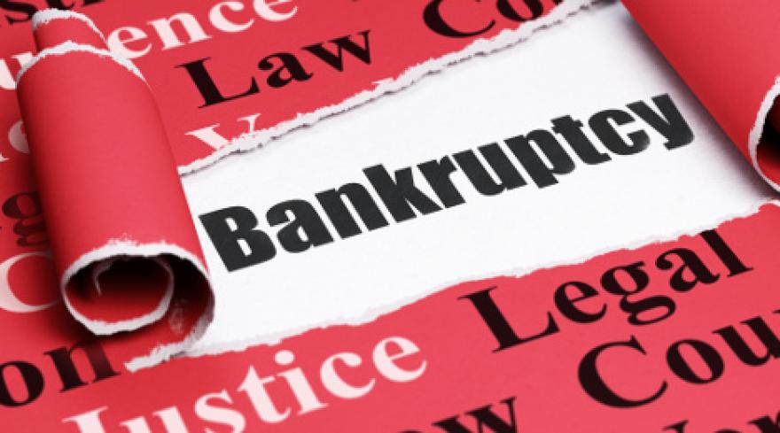 Close up shot of the word 'Bankruptcy' surrounded by Law, Legal, Justice wording.