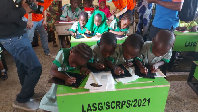 Universal Children's Day: StarTimes gifts writing tablets to pupils