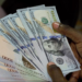Naira appreciates by N15.23 against dollar at official market