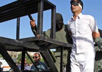 Iran executes man in public for killing wife