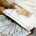 Naira gains by N1.65 against dollar at official market 