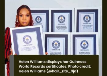 Nigerian woman sets record with ‘tallest wig’ in the World