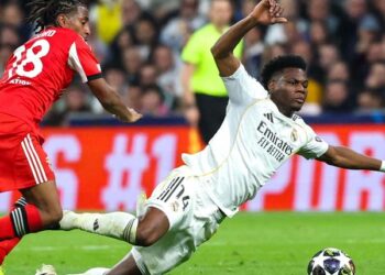 Real Madrid beat Benfica 2-1 to reach Champions League last 16