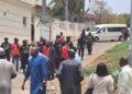 PHOTOS: EFCC operatives storm Malami’s Abuja resident in 5 buses