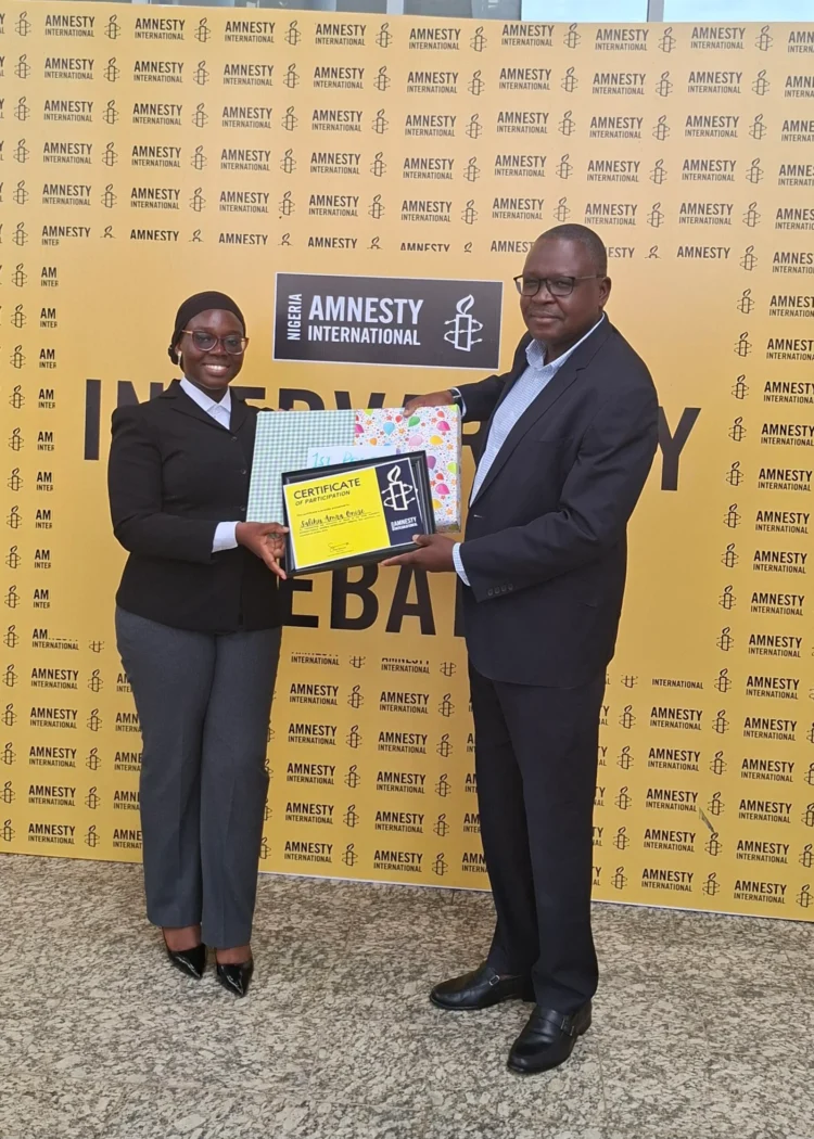 UniAbuja student wins Amnesty International’s 2026 inter-varsity debate