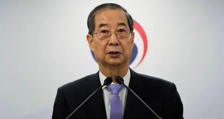 South Korean court reduces ex-PM’s jail term in martial law case