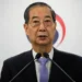 South Korean court reduces ex-PM’s jail term in martial law case