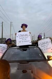 Ayra Starr’s mother promotes ‘Starr Girl’ album on Lagos streets